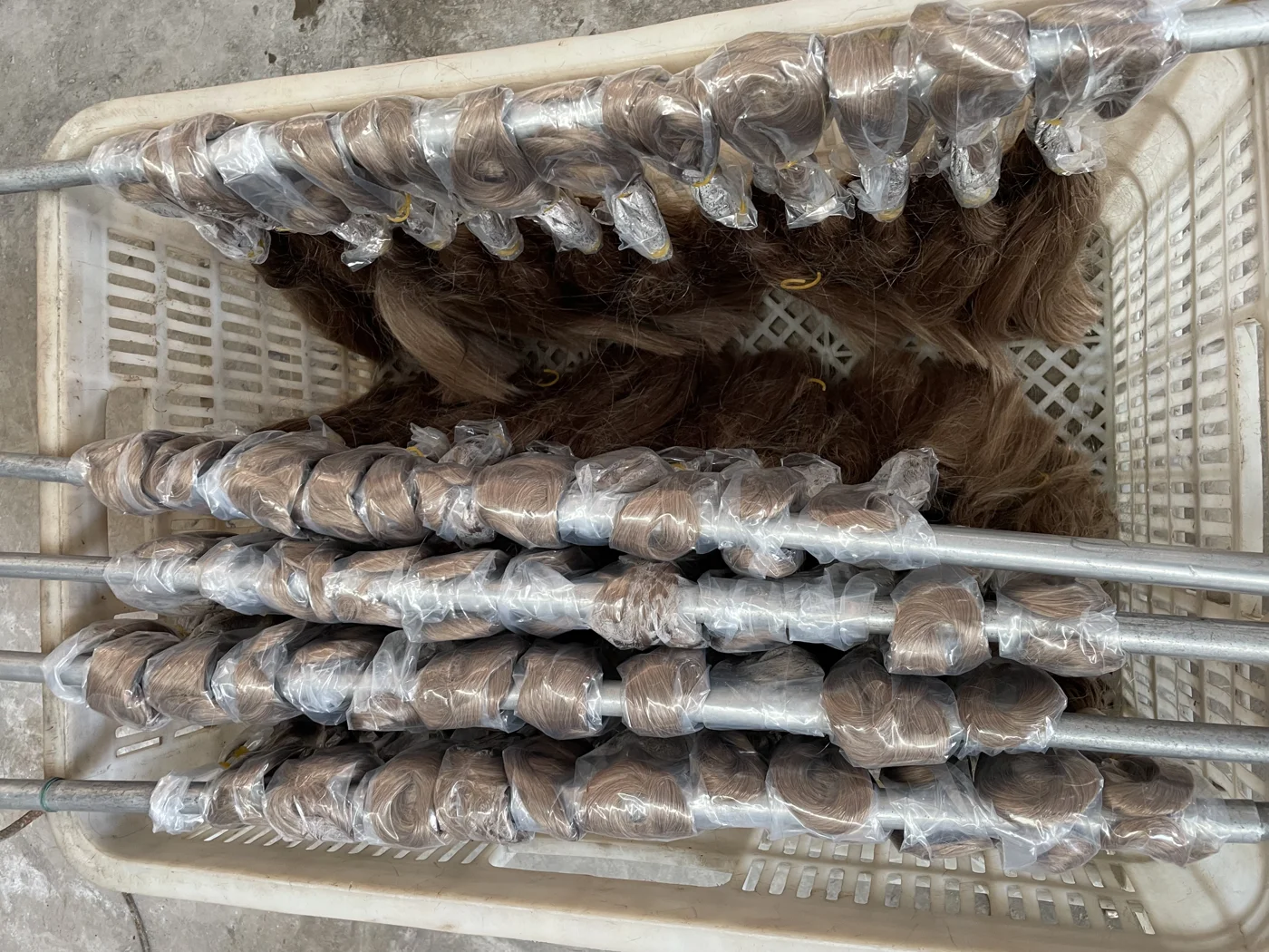 Packed hair bundles organised together.
